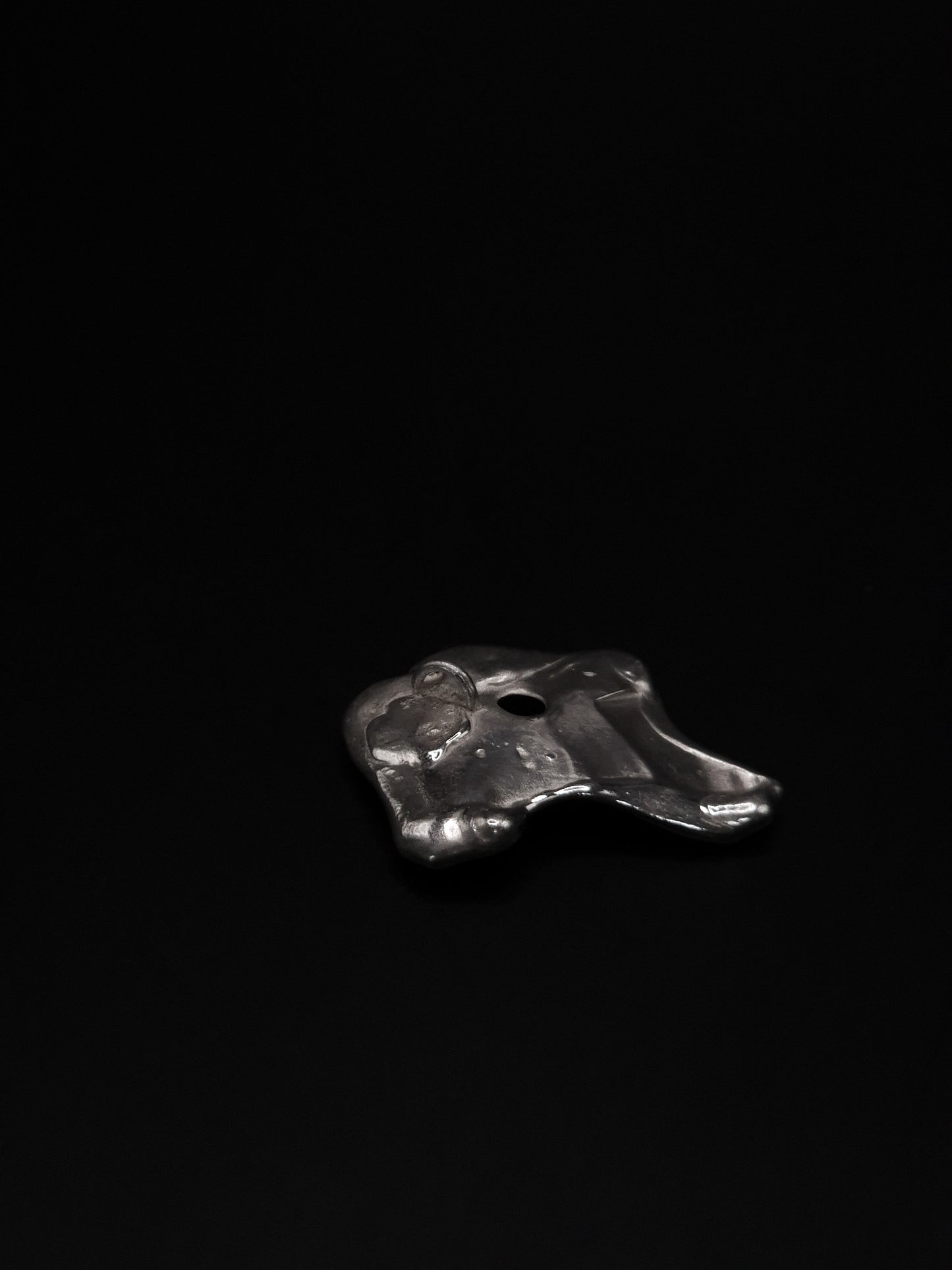 Pendentif source fossile